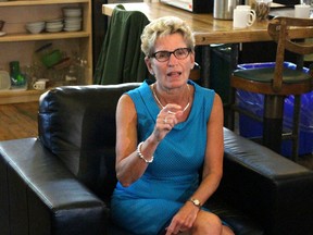Premier Kathleen Wynne provides the media an update on the Ontario Retirement Pension Plan on Tuesday, August 11, 2015. (Shawn Jeffords/Toronto Sun)