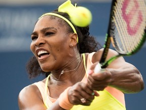 Serena Williams, of the United States, hits a return on her way to defeating Flavia Pennetta, of Italy, during tennis action at Rogers Cup in Toronto on August 11, 2015. (THE CANADIAN PRESS/Frank Gunn)