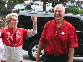 Bill Blair and Premier Kathleen Wynne at the opening of his federal election campaign office on August 8, 2015. (Veronica Henri/Toronto Sun)