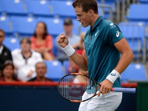 Vasek Pospisil reacts after making a point against Yen-Hsun Lu during the Rogers Cup at Uniprix Stadium in Montreal on Tuesday, Aug. 11, 2015. (Eric Bolte/USA TODAY Sports)