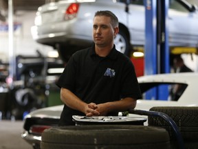Ryan Schulze, owner of Markham Auto Repair, says he is not impressed with Ontario Premier Kathleen Wynne's new pension plan on Tuesday August 11, 2015. (Jack Boland/Toronto Sun)