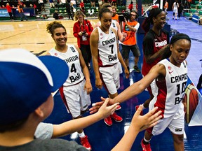 Team Canada players greet fans after Monday's game at the FIBA Americas Women's Championship. (Codie McLachlan, Edmonton Sun)