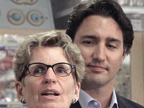 Ontario Premier Kathleen Wynne and Federal Liberal Leader Justin Trudeau at Michael's Catholic High School in Niagara Falls Jan. 17, 2014. (Mike DiBattista/Niagara Falls Review)
