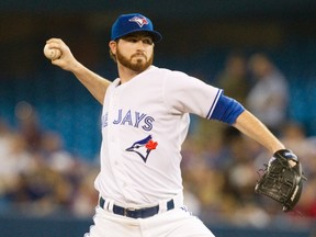 Blue Jays starting pitcher Drew Hutchison throws against the Athletics during first inning MLB action in Toronto on Tuesday, Aug. 11, 2015. (Fred Thornhill/THE CANADIAN PRESS)
