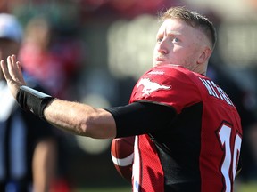 Stampeders quarterback Bo Levi Mitchell warms up prior to CFL action in Calgary on Saturday, Aug. 1, 2015. (Al Charest/Postmedia Network)