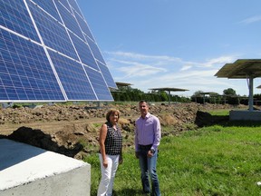 Mayor Joanne Vanderheyden and Solar Income Fund General Manager of Operations Dave Raney review the progress of the project at the Pike Road solar site.