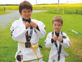 Nic Sullivan (left to right) and his brother Nathan proved they were worth opponents at a recent Budo Open Brazilian Jiu-Jitsu tournament.