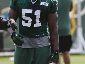 In this July 25, 2014, file photo, New York Jets' Ikemefuna Enemkpali (51) listens to a coach during an NFL football training camp in Cortland, N.Y.  (AP Photo/File)