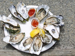 Vancouver Coastal Health has ordered eateries to cook all oysters harvested from B.C. waters and to only serve oysters from outside the province raw. (Reuters file photo)