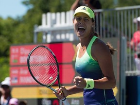 Ana Ivanovic of Serbia celebrates her victory over Olga Govortsova of Belarus during tennis action at Rogers Cup in Toronto on August 12, 2015. (THE CANADIAN PRESS/Frank Gunn)