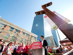 Liberal Leader Justin Trudeau speaks to a large crowd during a campaign visit to the Regina Farmers' Market in Regina on Aug. 12, 2015. )THE CANADIAN PRESS/Michael Bell)