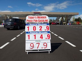 Costco members fill up with cheap gasoline at the newly opened pumps at the Wonderland Road North store in London. (CRAIG GLOVER, The London Free Press)