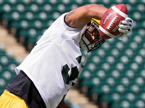 Calvin McCarty makes a one-handed grab during practice on July 25. (David Bloom, Edmonton Sun)