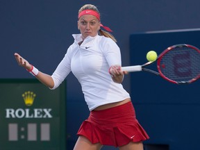 Petra Kvitova returns a ball to Victoria Azarenka in their match during the second round of the Rogers Cup in Toronto on Wednesday, Aug. 12, 2015. (Nick Turchiaro/USA TODAY Sports)