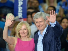 Conservative Leader Stephen Harper and his wife Laureen Harper attend a rally in Edmonton on Wednesday, August 12, 2015. (THE CANADIAN PRESS/Sean Kilpatrick)