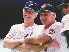 Mickey Mantle (left), shares a laugh with former Twins slugger  Harmon Killebrew during a legends game at Pittsburgh in July of 1994. Just more than 13 months later, Mantle passed away as one of the most beloved Yankees in team history. (Reuters)
