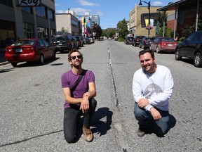 Andrew Knapp, left, and Christian Pelletier, of Up Fest, stand on Durham Street in Sudbury, Ont. where part of the festival is being held from Aug. 13-15. John Lappa/Sudbury Star/Postmedia Network