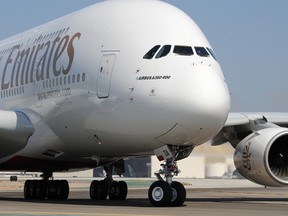 A file picture taken at Los Angeles International Airport on August 5, 2008 shows an Emirates Airlines Airbus A380 arriving from New York. AFP PHOTO/Robyn BECK