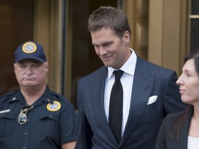 New England Patriots quarterback Tom Brady exits the Manhattan Federal Courthouse in New York August 12, 2015. (REUTERS/Darren Ornitz)