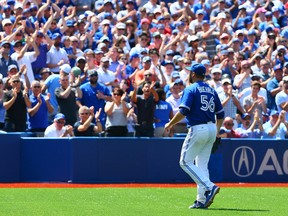 Mark Buehrle of the Toronto Blue Jays leaves the game in the eighth inning against the Oakland Athletics at the Rogers Centre on August 13, 2015. (Dave Abel/Toronto Sun/Postmedia Network)