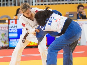 Priscilla Gagne (left) earned silver in the women's under-52-kg judo event at the Toronto 2015 Parapan Am Games. Gagne, who grew up in Sarnia, defeated three of her four opponents Wednesday to win the medal. (Handout/Sarnia Observer/Postmedia Network)