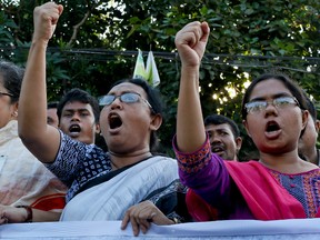 Bangladeshi activists who demand death penalty for war crime convicts shout slogans as they protest the killing of secular blogger Niloy Chottopadhay, in Dhaka, Bangladesh, Tuesday, Aug. 11, 2015. The killing of Chottopadhay, who also used an online name of Niloy Chowdhury is the fourth of a secular blogger since February. (AP Photo/ A.M. Ahad)