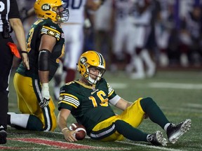Eskimos QB Matt Nichols reacts after getting sacked by the Alouettes defence during Thursday's game in Montreal. (Reuters)