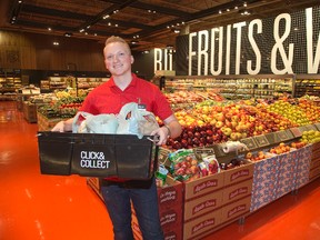 Stuart Dunlop is manager of Click and Collect, a new service offered at the Masonville Loblaws location in London, Ont. on Thursday August 13, 2015. Derek Ruttan/The London Free Press/Postmedia Network