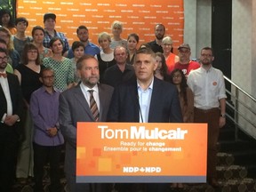 NDP leader Tom Mulcair unveiled former Saskatchewan Finance Minister Andrew Thomson as the party's candidate in Eglinton-Lawrence on Friday, Aug. 14, 2015 in Toronto. (DON PEAT/Toronto Sun)