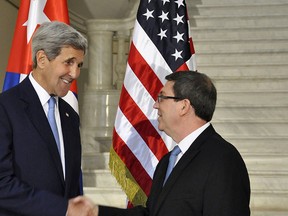 U.S. Secretary of State John Kerry (L) shakes hands with Cuba's Foreign Minister Bruno Rodriguez at the Cuban Foreign Ministry in Havana, Cuba, Aug. 14, 2015. REUTERS/Raul Abreu