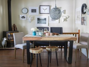 A gorgeous six-foot-long, wood topped table from Artemano with sturdy metal legs anchors the room.