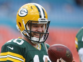 Quarterback Matt Flynn of the Green Bay Packers takes part in warmups before his team met the Miami Dolphins at Sun Life Stadium on October 12, 2014. (Joel Auerbach/Getty Images/AFP)