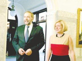 Federal NDP Leader Thomas Mulcair and Alberta NDP Premier Rachel Notley meet a few weeks after she became premier. Graham Thomson cautions the federal NDP cannot expect much of a boost from the fortunes of the provincial party. (Catherine Griwkowsky, Postmedia Network)