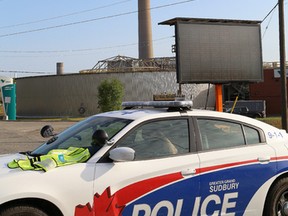 Greater Sudbury Police block the entrance to Vale's smelter complex in Copper Cliff, Ont. following a gas leak on Thursday August 13, 2015. John Lappa/Sudbury Star/Postmedia Network