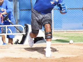 Marcus Stroman donned his left knee brace and threw his second bullpen session on Friday in Dunedin since tearing his left ACL back during spring training.  ( Eddie Michels photo)