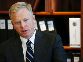 George Brauchler, lead prosecutor in the case against convicted Colorado theatre shooter James Holmes, responds to questions during an interview Friday, Aug. 14, 2015, in Centennial, Colo. Brauchler said that the jury's refusal to sentence Holmes to die for one of the worst massacres in the country's history does not mean the public is growing wary of capital punishment because only a single juror blocked the execution. (AP Photo/David Zalubowski)