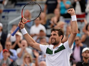 Jeremy Chardy reacts after winning his match against John Isner during the Rogers Cup at Uniprix Stadium in Montreal on Friday, Aug. 14, 2015. (Eric Bolte/USA TODAY Sports)