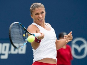 Sara Errani hits a return against Lesia Tsurenko during Rogers Cup quarterfinal action in Toronto on Friday, Aug. 14, 2015. (Darren Calabrese/THE CANADIAN PRESS)