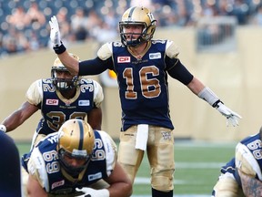 Winnipeg Blue Bombers quarterback Robert Marve (16) calls the plays during the first half of CFL action against the Toronto Argonauts in Winnipeg Friday, August 14, 2015. THE CANADIAN PRESS/John Woods