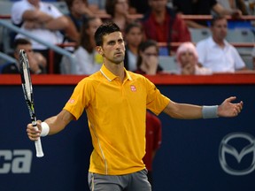 Novak Djokovic reacts after losing a point to Ernests Gulbis during the Rogers Cup at Uniprix Stadium in Montreal on Friday, Aug. 14, 2015. (Eric Bolte/USA TODAY Sports)
