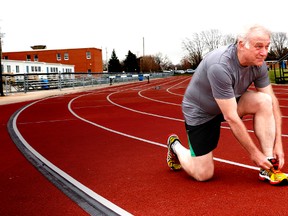 Bluewater Health's Dr. Mark Taylor laces up on the Sarnia Central Athletic Facility track. The marathon runner is the face of the Bluewater Health Foundation's second annual Race for Health fundraiser, Sept. 13. (Handout)