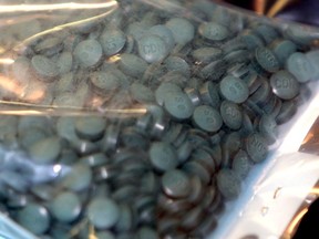 The Calgary Police Service, Alberta Health Services and national law enforcement partners came together to again raise awareness about the increasing quantity and availability of fentanyl in Alberta in Calgary on Thursday August 13, 2015. (Darren Makowichuk/Calgary Sun/Postmedia Network)