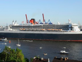 Cruise ship Queen Mary II leaves the harbour during a sailing parade on the habour's 822nd anniversary in Hamburg May 8, 2011.  (Fabian Bimmer/Reuters files)