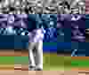 Josh Donaldson throws his bat down as he walks as Toronto Blue Jays lost 4-1 to the New York Yankees in Toronto, Ont. on Monday August 10, 2015. Michael Peake/Toronto Sun/Postmedia Network