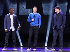 Actors Anthony Mackie, Chris Evans and Producer Kevin Feige of Captain America: Civil War took part today in "Worlds, Galaxies, and Universes: Live Action at The Walt Disney Studios" presentation at Disney's D23 Expo 2015 in Anaheim, Calif.   (Jesse Grant/Getty Images for Disney/AFP)
