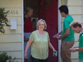 Green Party leader Elizabeth May does some door to door campaigning in West Vancouver, B.C.,  Tuesday, August 11, 2015.  (THE CANADIAN PRESS/Jonathan Hayward)