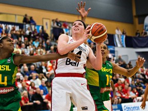 Canada's Katherine Plouffe looks for a shot as Brazil's Isaballe Ramona defends during FIBA Americas semifinal action Saturday at the Saville Centre (Codie McLachlan, Edmonton Sun_.