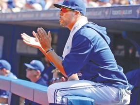 Always the ‘people person,’ as his mom refers to him, David Price cheers on his Blue Jays teammates from the dugout during yesterday’s game against the Yankees. (MICHAEL PEAKE, Toronto Sun)