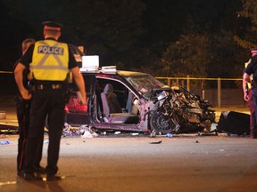 Police at the scene of a fatal crash at Lawrence Ave. E. and Bellamy Rd. N. early Sunday, Aug. 16, 2015. (John Hanley/Special to the Toronto Sun)