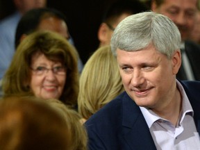 Senator Marjory LeBreton, left, looks on as Conservative Leader Stephen Harper makes a campaign stop in Ottawa on Sunday, August 16, 2015. 
THE CANADIAN PRESS/Sean Kilpatrick